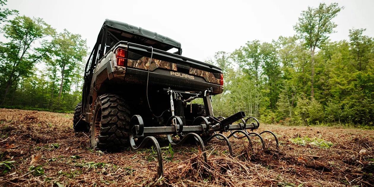 Rear view of a Ranger XP 1000 working the ground Hunting
