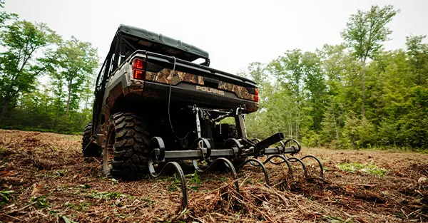 Rear view of a Ranger XP 1000 working the ground Hunting