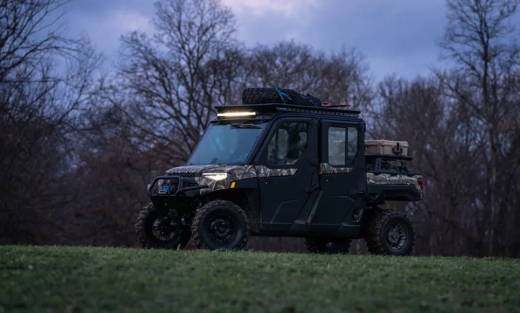 Ranger CREW 570 with its headlights on