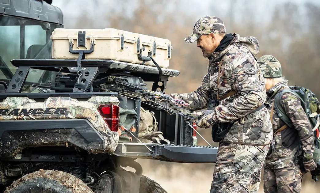 Owner of Ranger CREW 570 unloading hunting gear