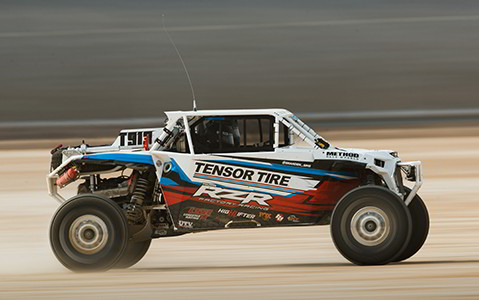 Two RZR owners in their vehicle