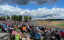 A crowd of people seated on the stands of an event