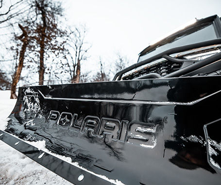 Close-up angle on a Polaris Snowplow system.