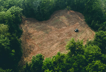 Upper view of a Polaris Ranger vehicle working on a food plot for deer hunting