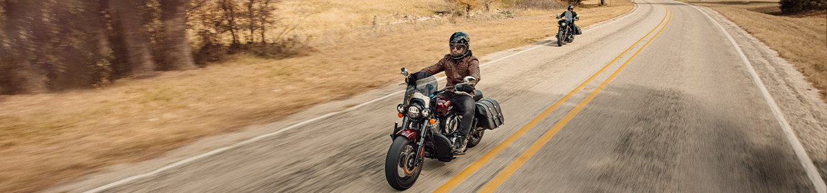 A biker riding his Indian Challenger Limited on the highway