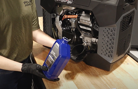 a man viewing a p2000i generator on a desk