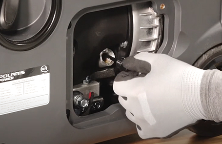 closeup of a man using a p3200ie generator