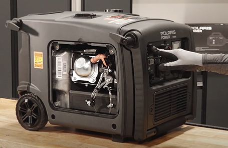 closeup of a man using a p3200ie generator