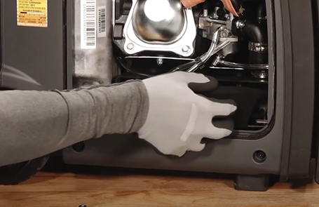 closeup of a man working on a p3200ie generator