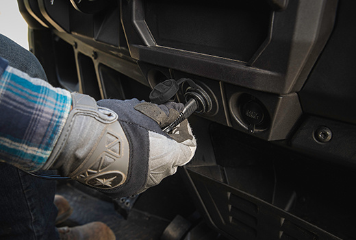 RZR 570 going down a green trail road