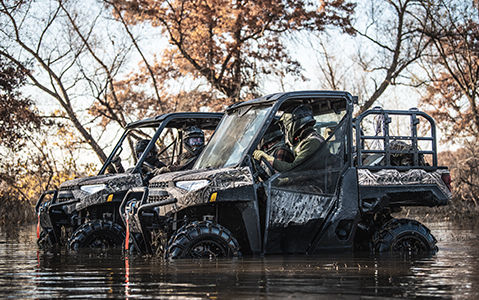 Two Ranger Waterfowl edition in a lake