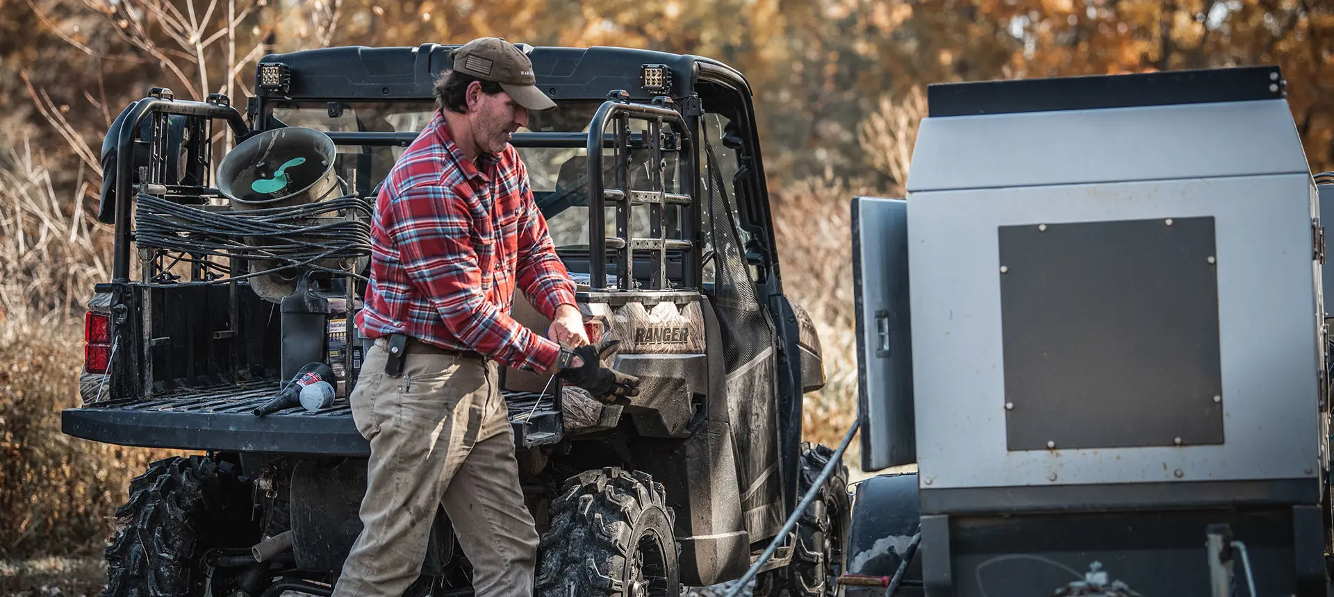 A Ranger owner walking in front of his vehicle