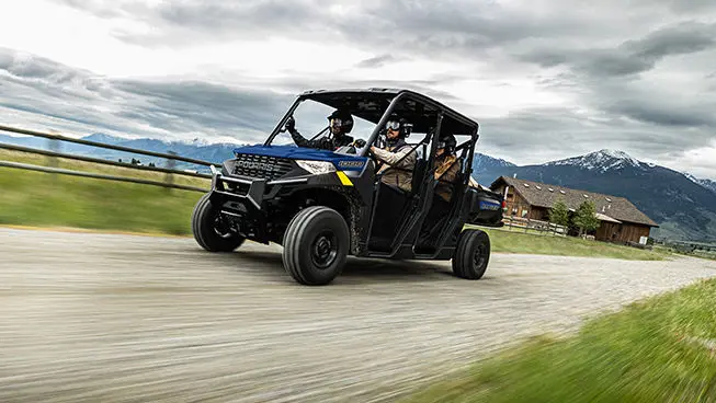 Ranger Crew 1000 racing on a trail