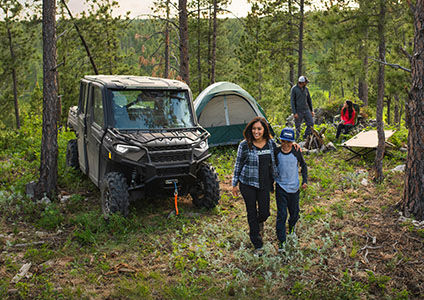 Family together near their Ranger Crew XP 1000