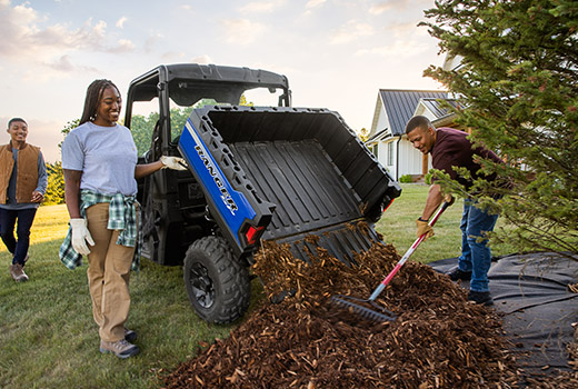 RZR 570 going down a green trail road