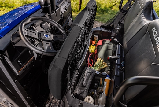 RZR 570 going down a green trail road
