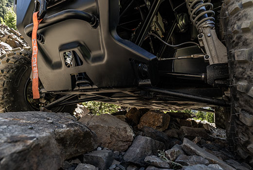 RZR 570 going down a green trail road