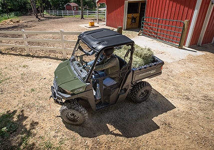 RANGER SP 570 taking a tight turn on a farm