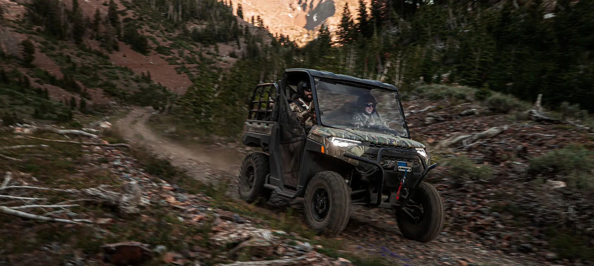 polaris ranger xp 1000 big game edition utv on a trail
