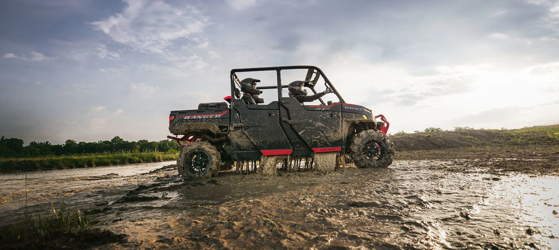 polaris ranger crew xp 1000 high lifter edition utv cruising through mud