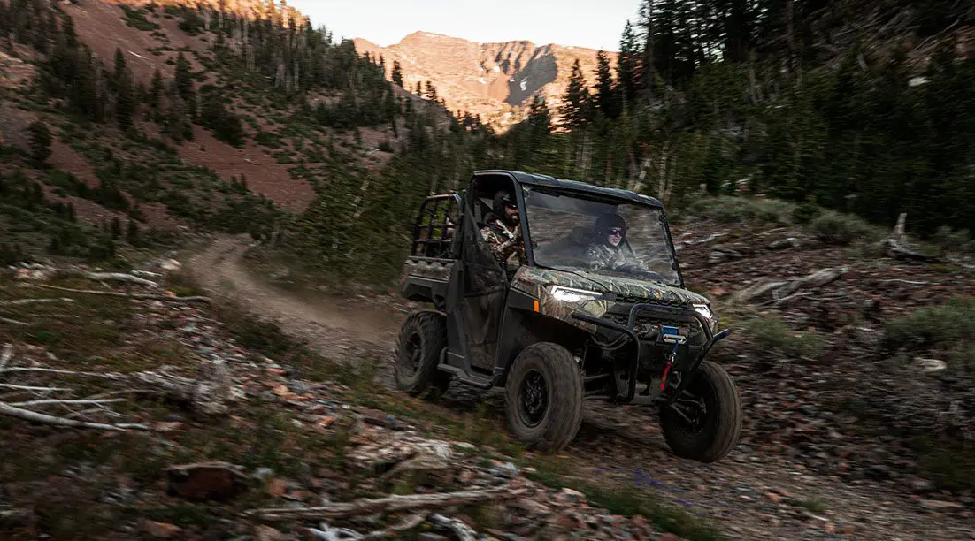 polaris ranger xp 1000 big game edition utv on a trail