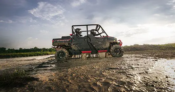 polaris ranger crew xp 1000 high lifter edition utv cruising through mud