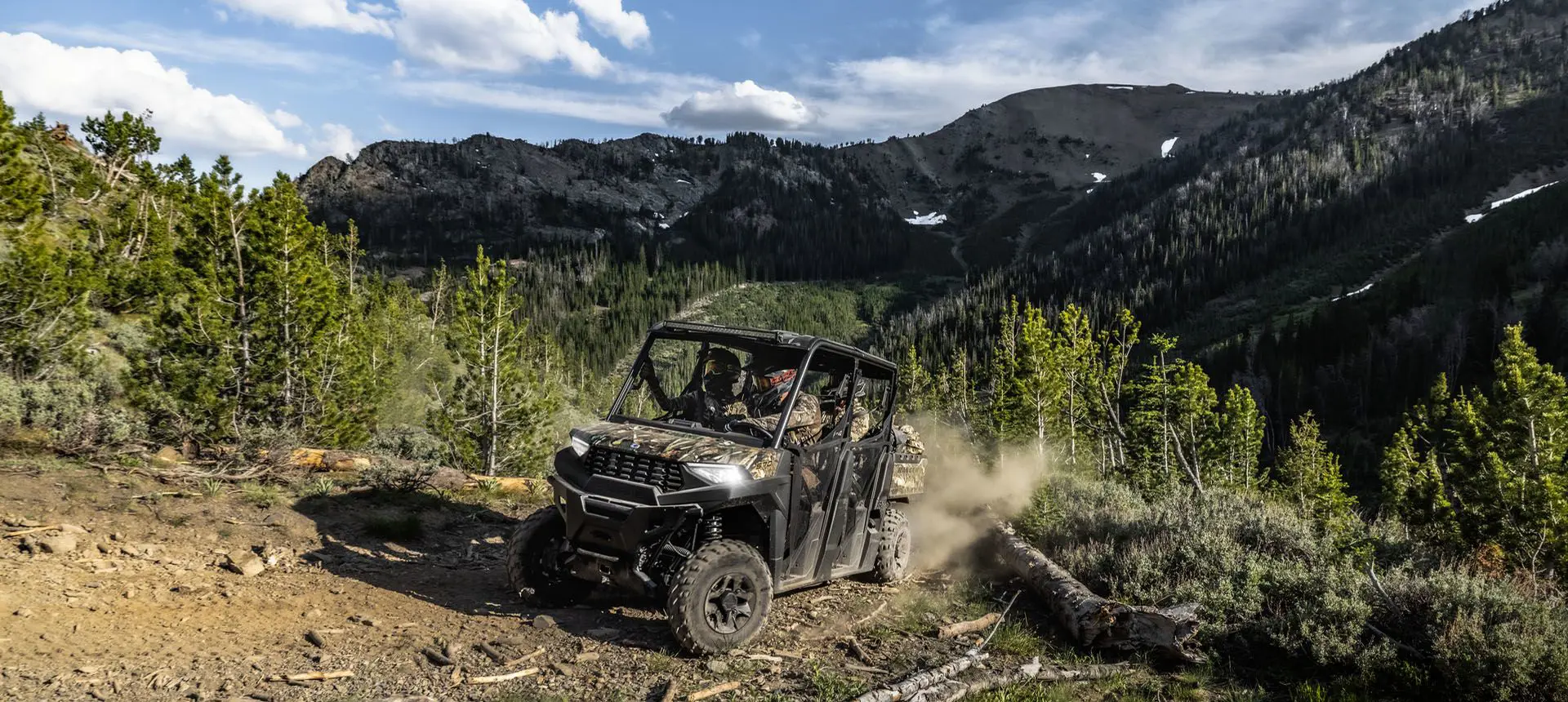 ranger crew sp 570 driving in a chopped down forest