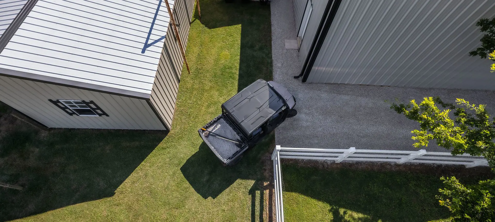 aerial view of a ranger crew sp 570 taking a tight corner on a farm