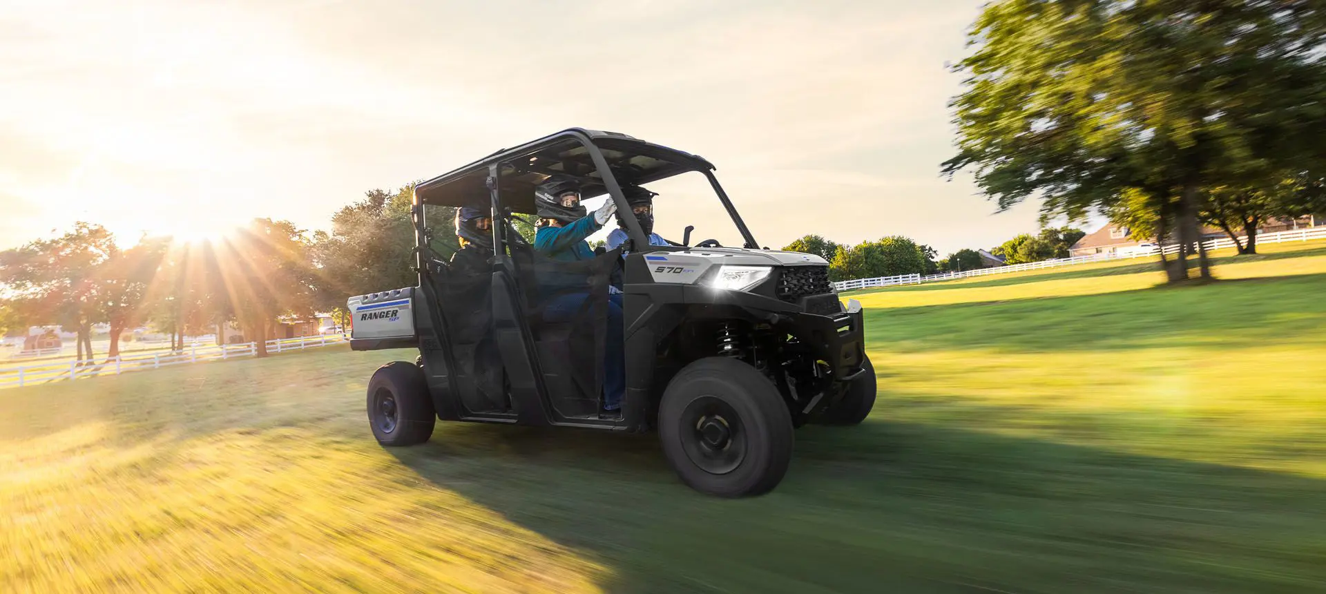 ranger crew sp 570 cruising in a field