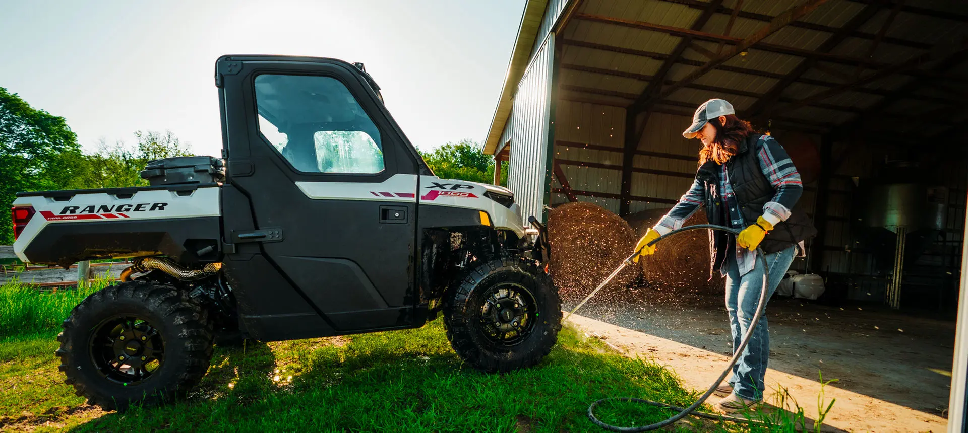 farmer washing her ranger xp 1000 northstar edition trail boss utv