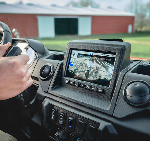 The Polaris RIDE COMMAND screen displaying a live camera view from the vehicle, as seen from the driver's perspective.
