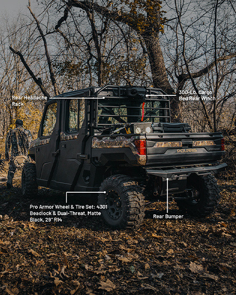 Rear headache rack, 300-lb cargo bed rear winch, Pro Armor Wheel & Tire Set and rear bumper accessories from the Hunt package installed on a 2025 Polaris RANGER CREW XP 1000 NorthStar Edition UTV. 