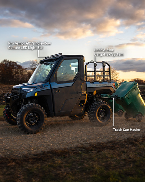 Pro Armor 40 inches Single-Row Combo LED Light Bar, Lock & Ride CargoMax Rack System, and Trash Can Hitch and Hauler set accessories from the Landowner Package installed on a 2025 PolarisRANGER XP 1000 NorthStar Trail Boss Edition UTV.