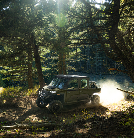 A 2026 Polaris RANGER XD 1500 NorthStar Edition extreme duty UTV climbing a hill with ease thanks to the the Hill Assist feature.