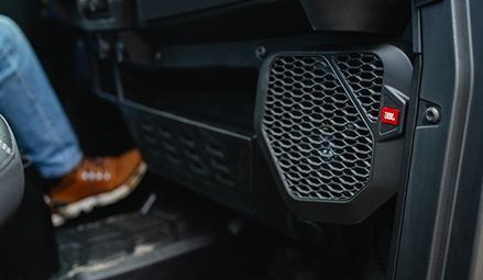 JBL Trail Pro 2000 Audio system speakers inside the all-season cab of a 2026 Polaris RANGER CREW XP 1000 NorthStar Texas Edition UTV.
