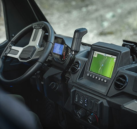 Interior view showcasing the dash and RIDE COMMAND touchscreen display of a Polaris RANGER NorthStar UTV.