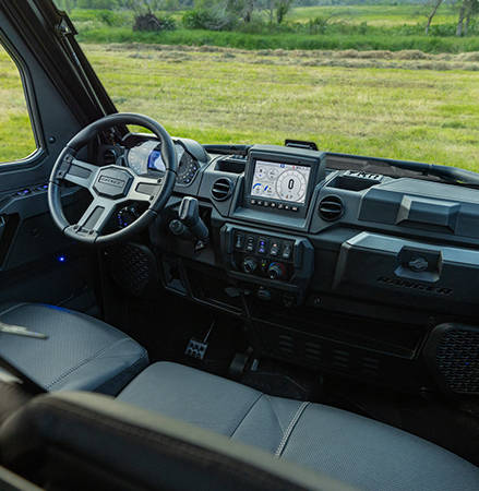 The dashboard in the cab of a 2027 Polaris RANGER XP 1000 NorthStar Trail Boss Edition UTV.