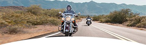 Indian Motorcycle riders on the road.