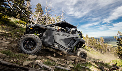 RZR Pro XP climbing a rocky hill