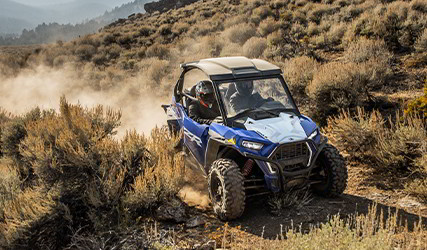 RZR Trail S on a trail road