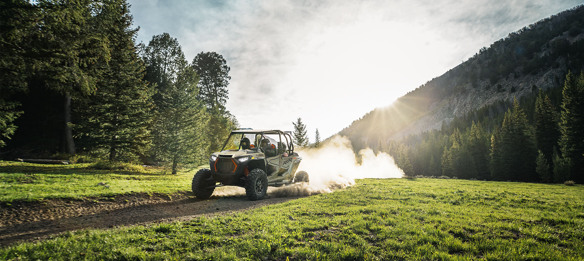 RZR XP 4 Turbo on a green field