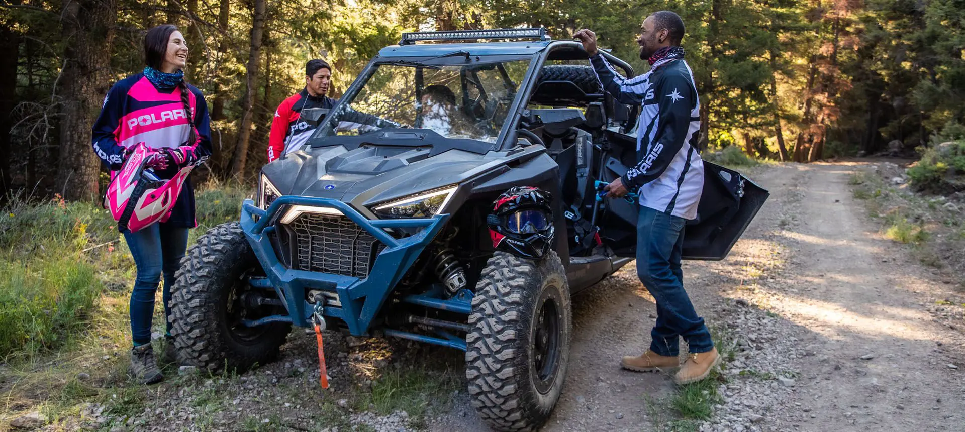 rzr riders relaxing after a forest trail ride