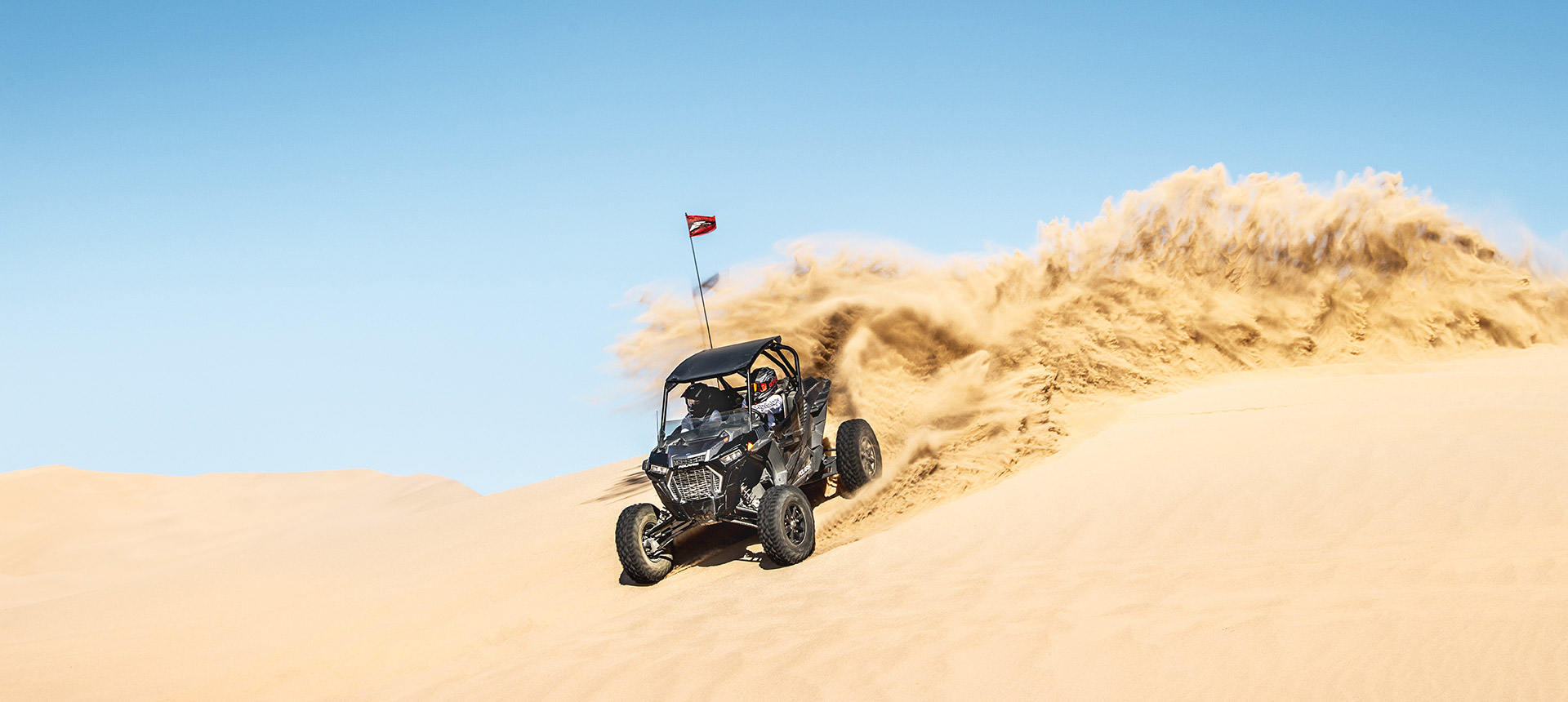 RZR Turbo S racing in the desert