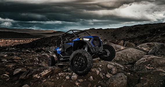 RZR Turbo S Velocity climbing a rocky hill
