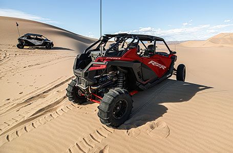 Polaris RZR Pro XP 4's racing through the dunes