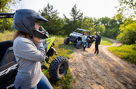 friends and their RZR RS1's parked on the side of the trail