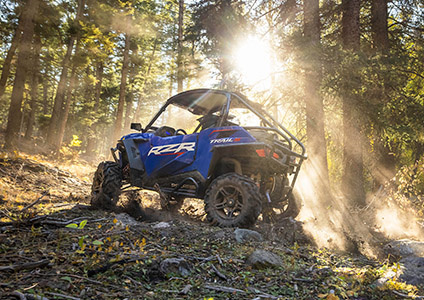 RZR Trail S with front and rear bumper options equipped