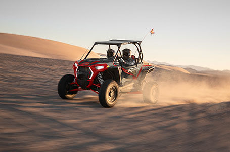 polaris xp 1000 with ride command cruising through the dunes