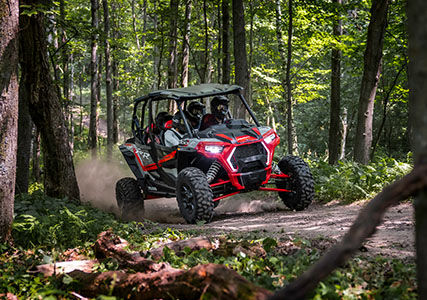 RZR XP 4 1000 through the forest