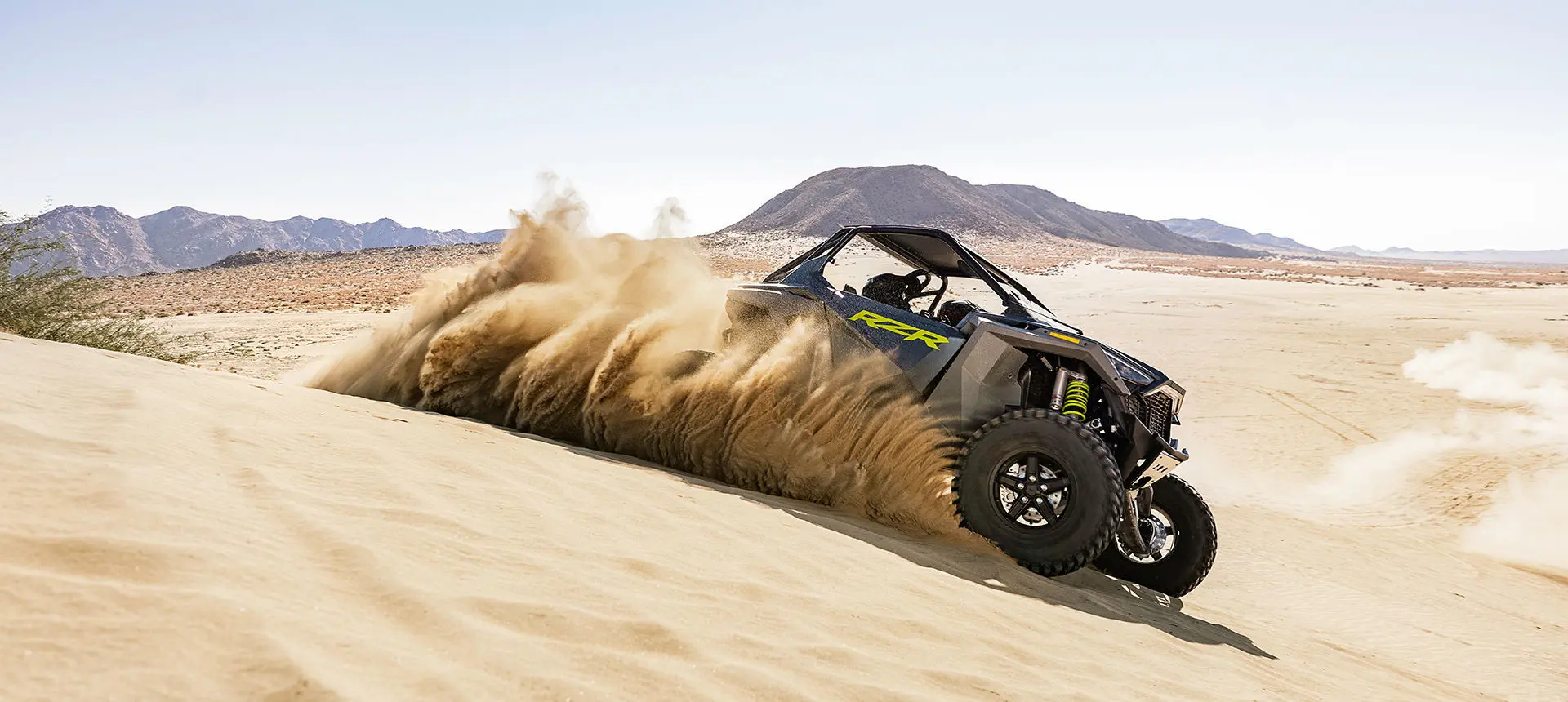 polaris rzr turbo r driving in the desert